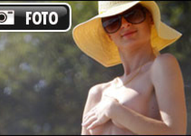 Parisas Hiltones pikantā fotosesija. Bikini un topless