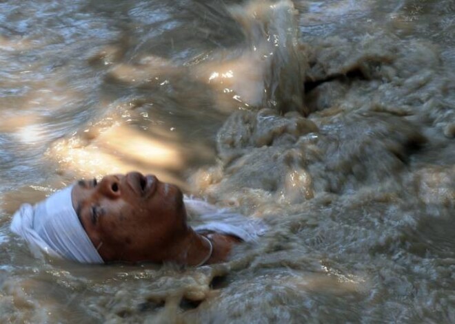 Aptuveni pirms gada nopostītajā Haiti Lieldienas tiek sagaidītas ar Vudū rituālu.