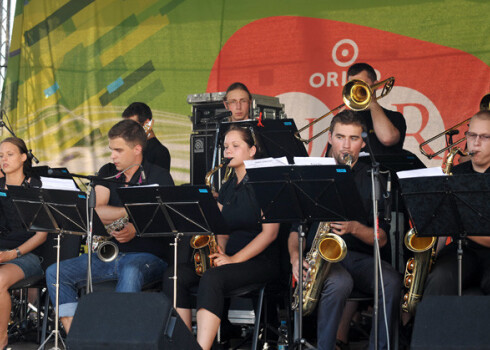 Jelgavas „Big Band” 12. jūlija koncerts būs atgriešanās uz „Origo Summer Stage” skatuves. Stacijas laukumā neaizmirstamu koncertu jelgavnieki sniedza arī 2010. gada vasarā.