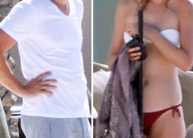 Di Kaprio atkal jauna draudzene modele. Pārītis atpūšas Ibicā. FOTO