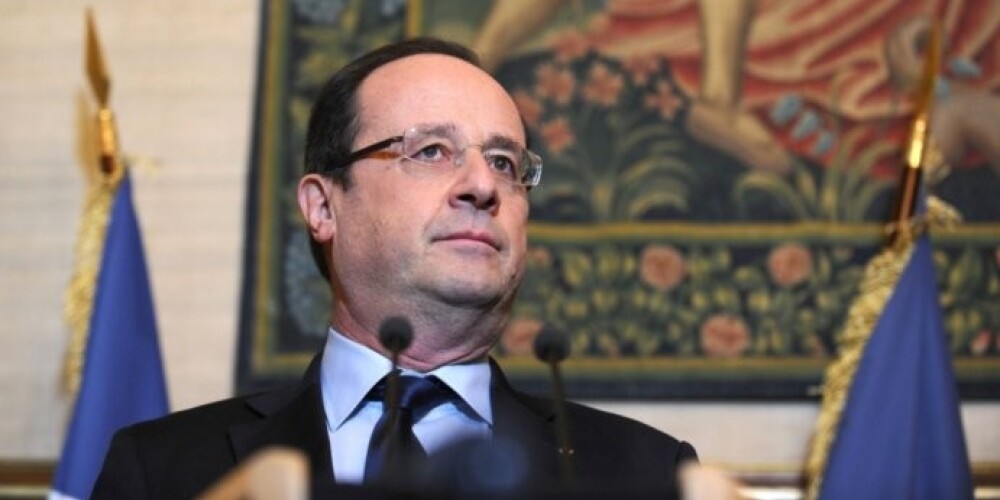 AFP изъяло из фотобанка конфузный снимок президента Франции. ФОТО