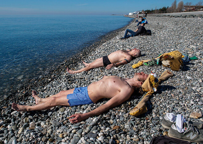 Sočos olimpisko spēļu norises vietā teju +20 grādu. FOTO