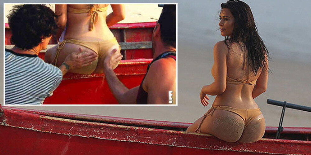 Ким Кардашьян нуждается в помощи двух ассистентов во время бикини-фотосессии