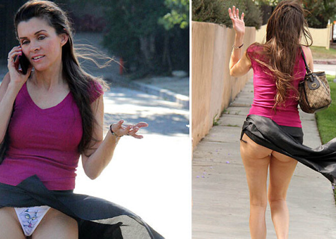 Упс! Пока актриса говорила по телефону, ветер поднял ее юбку