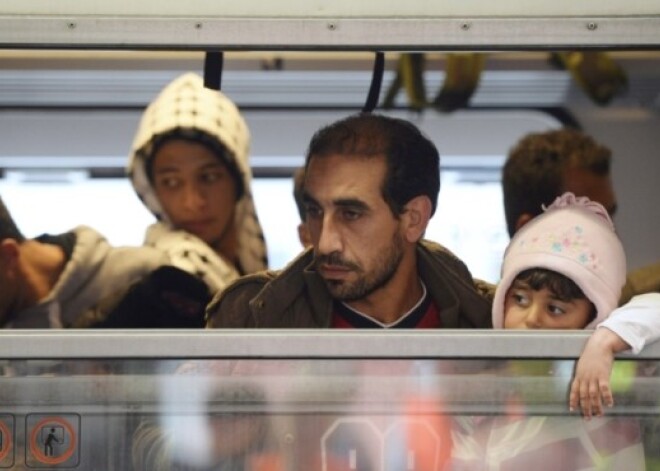 Премьер: Латвии придется определиться с приемом беженцев раньше, чем планировалось