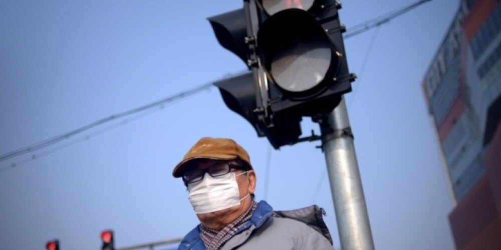 Pekinā smoga dēļ iesaka neatstāt telpas
