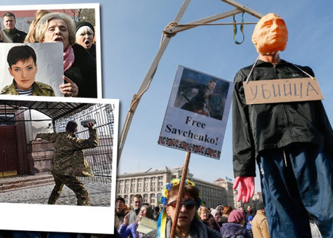 Kijevā protestētāji pie Krievijas vēstniecības pieprasa pilotes atbrīvošanu un pakar Putina lelli. FOTO