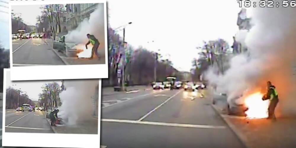 Tā policisti dzēsa auto, kas dega netālu no Brīvības pieminekļa. VIDEO