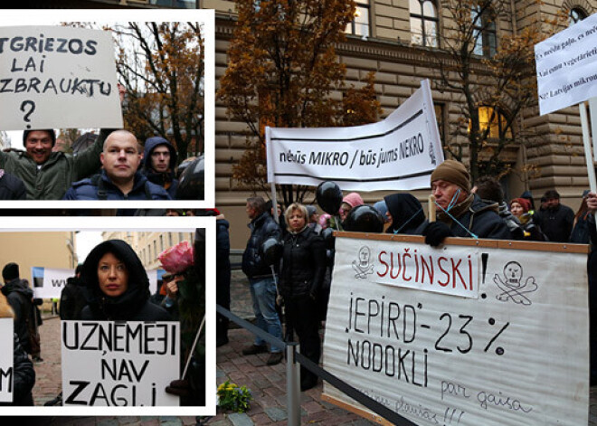 Cilvēki piketē pret mikrouzņēmuma nodokļa likvidēšanu, deputāti neuzskata par vajadzīgu aprunāties. FOTO. VIDEO