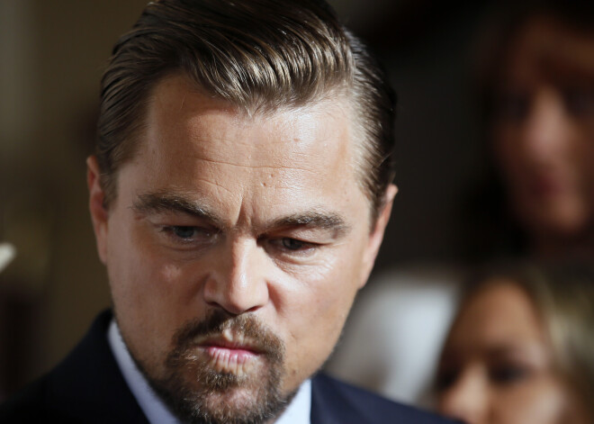 Leonardo di Kaprio saticies ar Donaldu Trampu