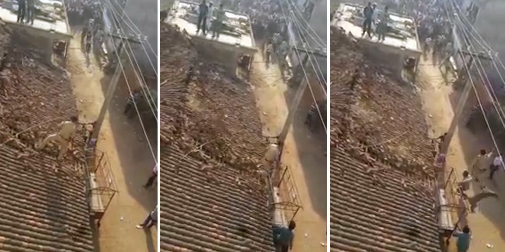 Biedējošā video fiksē vīrieša lēcienu no jumta, lai glābtos no leoparda uzbrukuma
