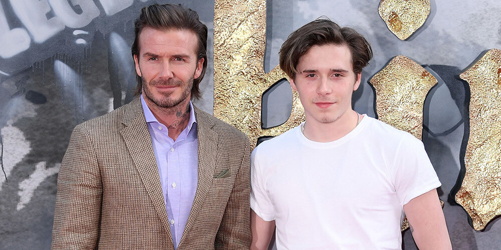 Экс-футболист Дэвид Бэкхем в качестве моральной поддержки привел с собой на премьеру фильма «Меч короля Артура» сына Бруклина