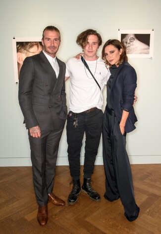 Дэвид и Виктория Бэкхемы с сыном Бруклином