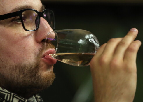 CRIMEA, RUSSIA - JUNE 12, 2017: A man tasting sparkling wine at the Novy Svet Winery. Valery Sharifulin/TASS