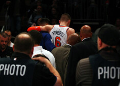 Nov 29, 2017; New York, NY, USA; New York Knicks center Kristaps Porzingis (6) is helped off the court after being injured against Miami Heat during the first half at Madison Square Garden. Mandatory Credit: Andy Marlin-USA TODAY Sports