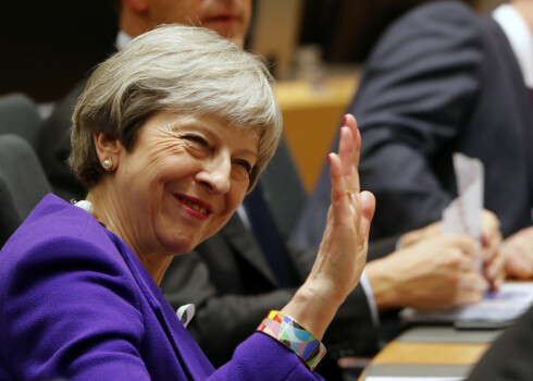 Britain's Prime Minister Theresa May waves as she attends a European Union leaders summit in Brussels, Belgium, March 22, 2018. REUTERS/Wolfgang Rattay