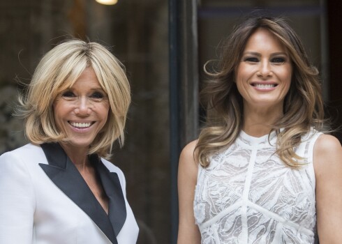 French First lady Brigitte Macron, left, and US First Lady Melania Trump arrive ahead of a NATO spouses dinner at Jubilee Museum in Brussels, Belgium, Wednesday, July 11, 2018. NATO leaders gathered in Brussels Wednesday for a two-day summit to discuss Russia, Iraq and their mission in Afghanistan. (Stephanie Lecocq/Pool Photo via AP)