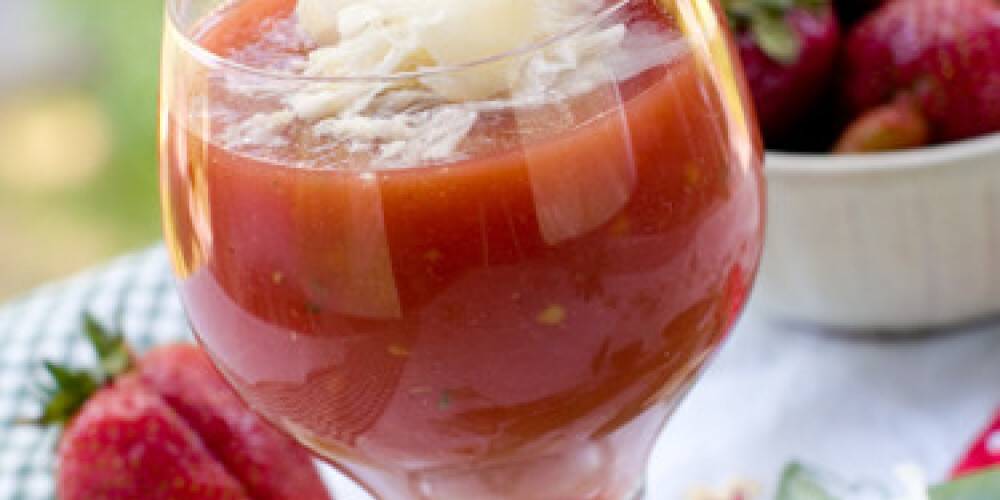 A glass of fresh strawberry and tomato gazpacho (cold soup). Selective focus