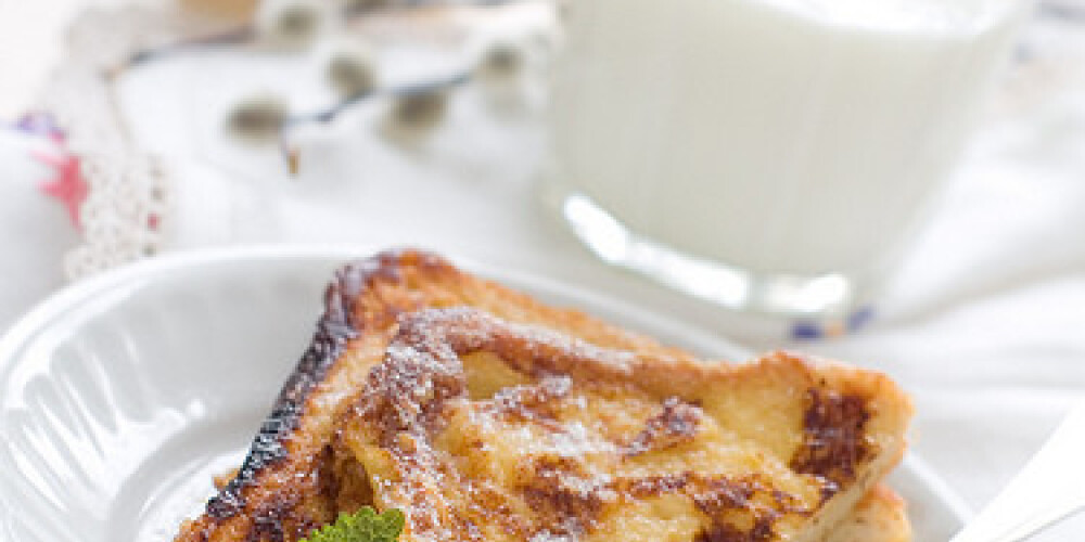 French toasts with apple jam and glass of milk for breakfast