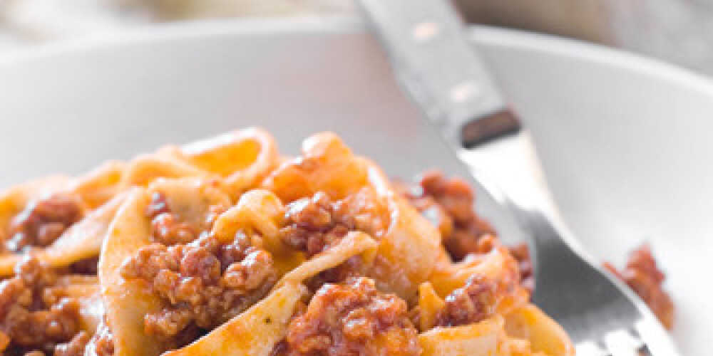 Tagliatelle with meat and tomato sauce. Selective focus