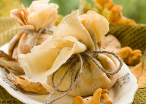 Pancake bag with mushrooms. Selective focus