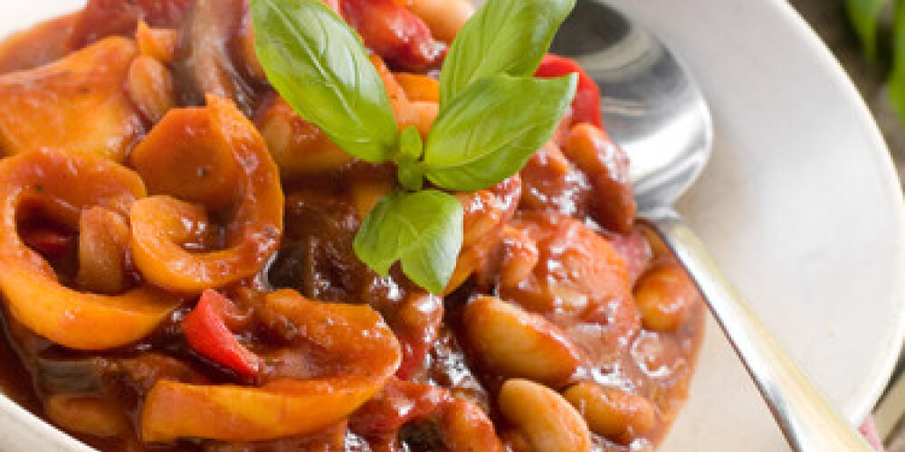 Vegetable stew with glass of wine. Selective focus