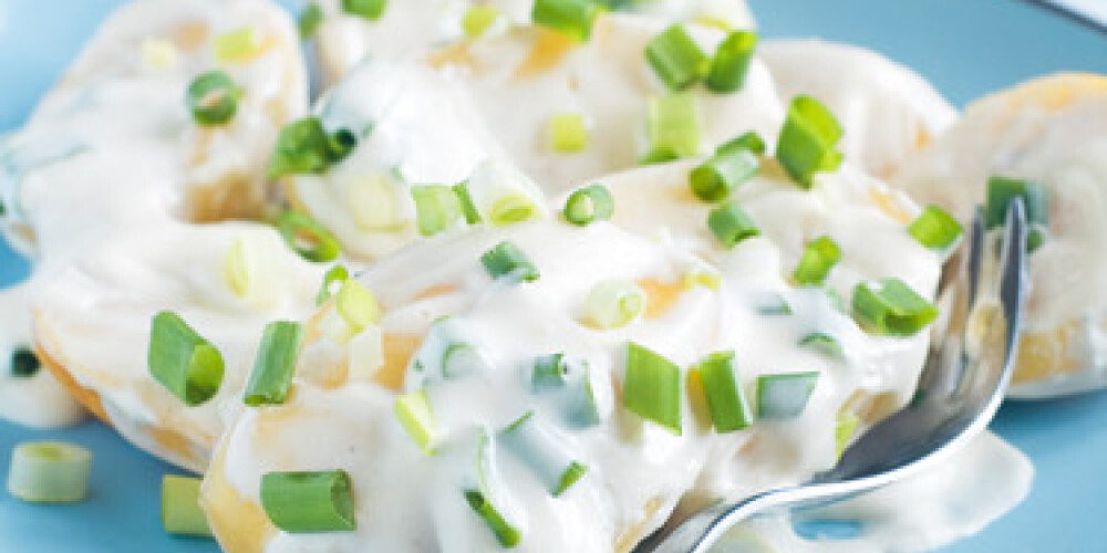 Potato salad with mayonnaise and spring onion, selective focus