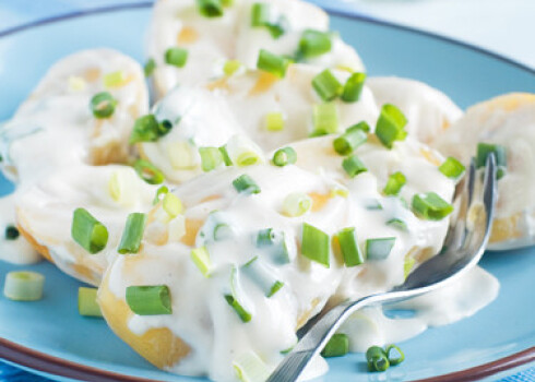 Potato salad with mayonnaise and spring onion, selective focus