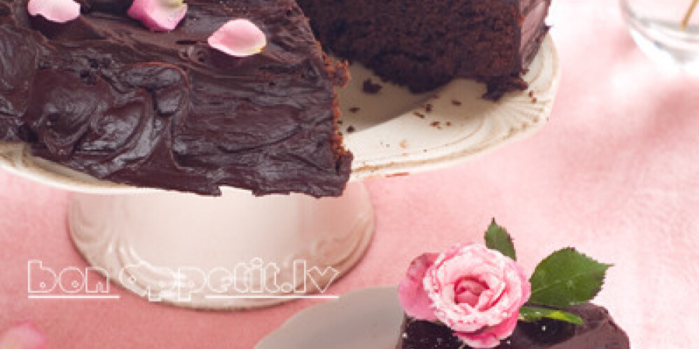 Chocolate cake with sugar rose, selective focus