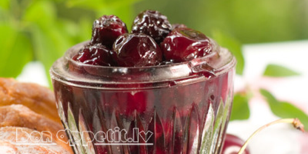 Cherry jam in glass bowl, selective focus