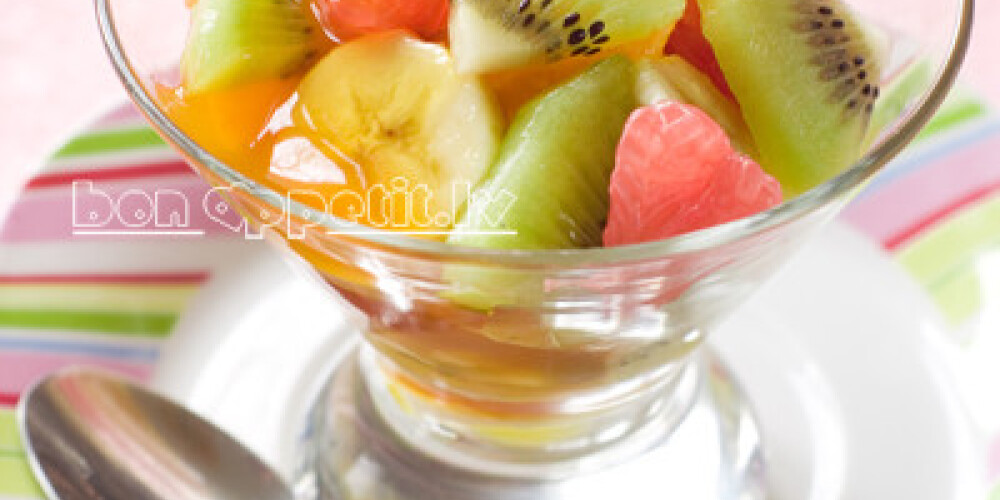 Fresh fruit salad in glass bowl, selective fcous