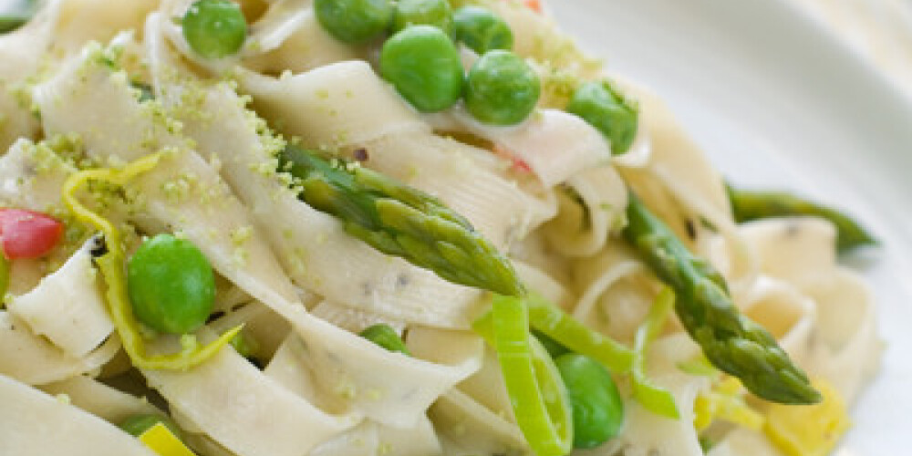 Pasta with asparagus and peas, selective focus