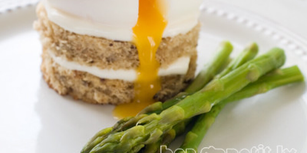 Bread with poached egg with asparagus, selective focus