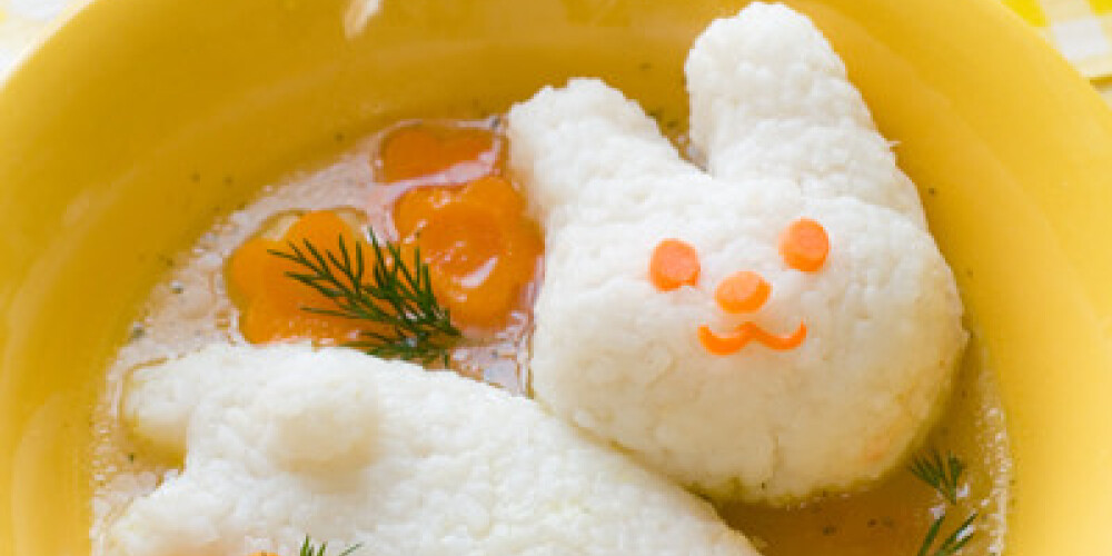 Chicken soup with rice rabbit, selective focus. Shot for a story on homemade, organic, healthy baby foods.