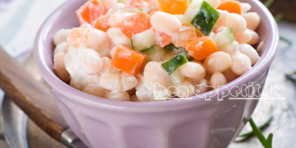 Bean salad with carrot, cucumber and apple, selective focus