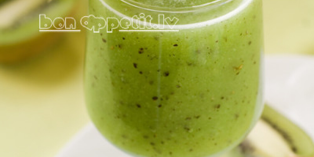 Fresh kiwi smoothie in glass, selective focus