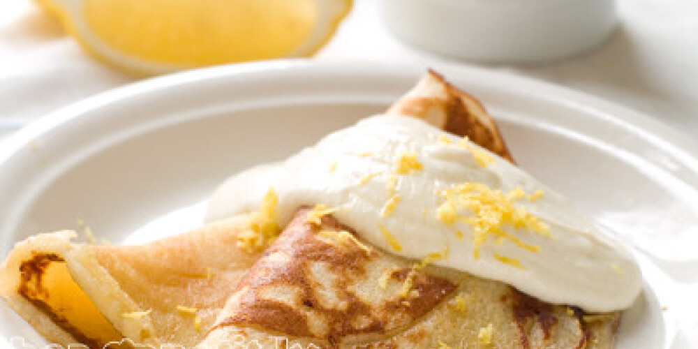 Homemade pancake with honey, yoghurt and lemon, selective focus