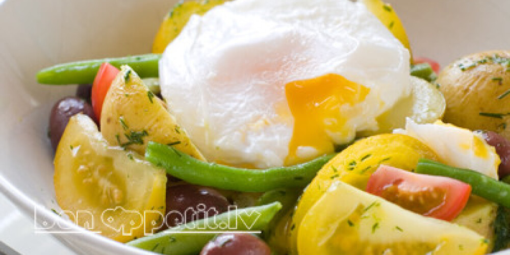 Vegetable salad with poached egg, selective focus