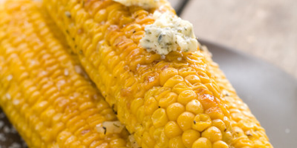 Grilled corn with butter, selective focus