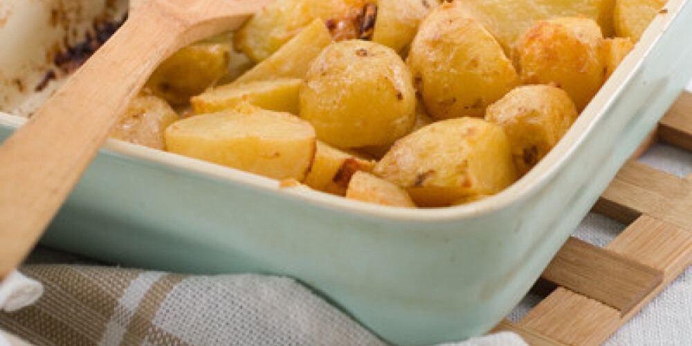 Roasted potatoes in baking from, selective focus