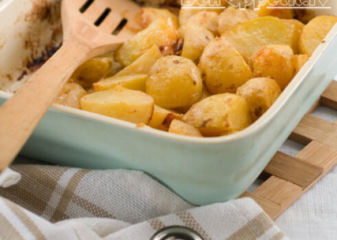 Roasted potatoes in baking from, selective focus