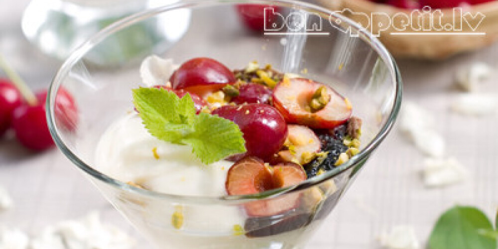 Yoghurt dessert with cherry, selective focus