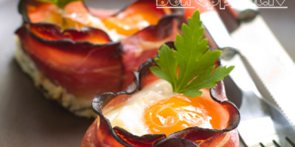 Coddled egg with bacon for breakfast, selective focus