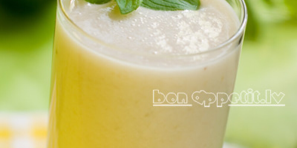 Banana and lime milkshake with mint, selective focus