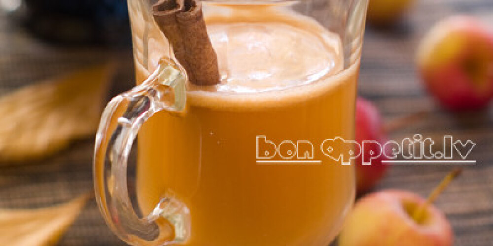 Fresh apple hot drink with cinnamon, selective focus