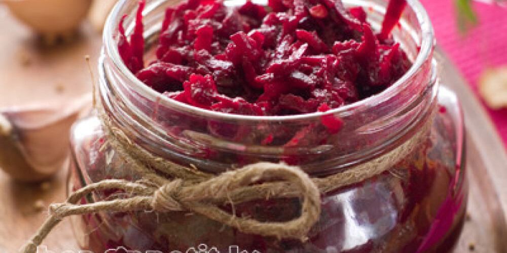 Preserved beet in glass jar, selective focus