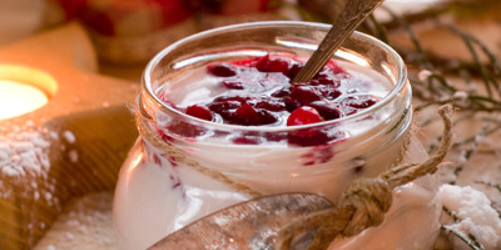 Yoghurt dessert with cranberry for Christmas, selective focus