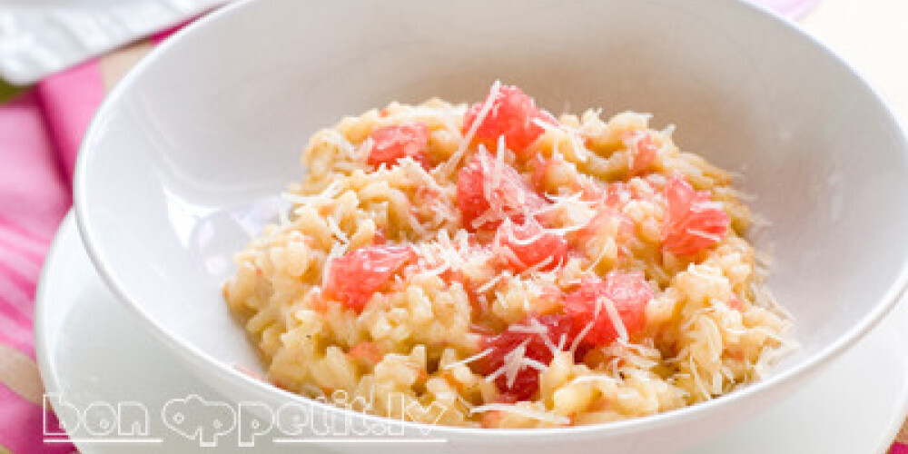 Risotto with grapefruit and cheese, selective focus