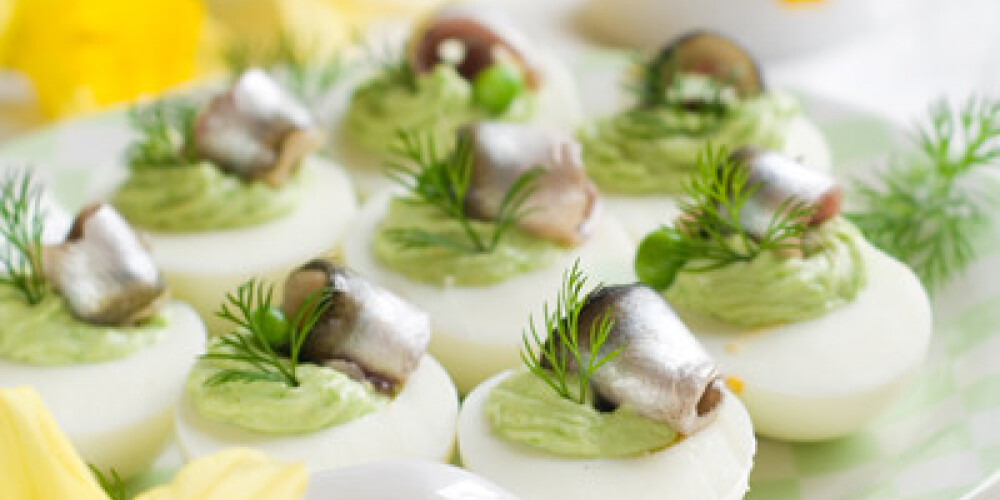 Deviled eggs with anchovy for Easter, selective focus