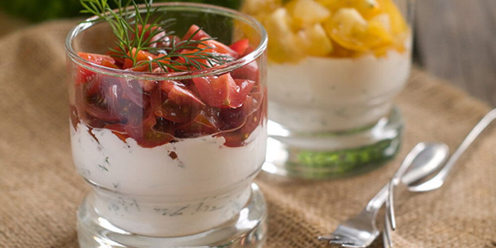 Salad with cottage cheese and tomatoes, selective focus